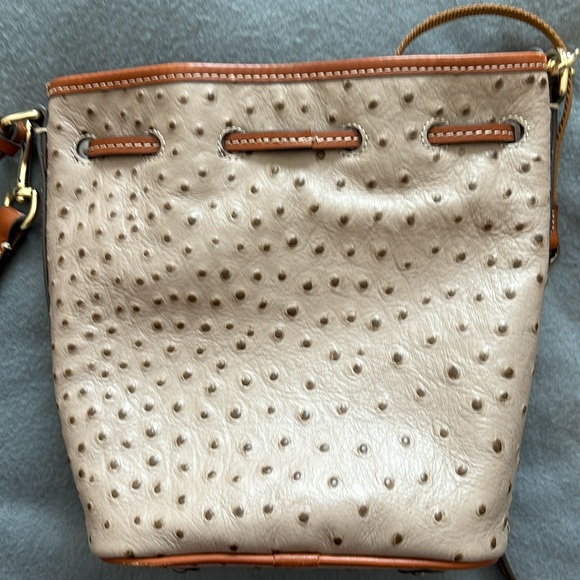 Dooney & Bourke bucket purse. Color~tan & camel ostrich leather. Pics for size. - Picture 8 of 16